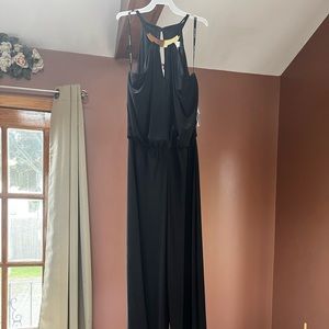 Black maxi jumpsuit with gold neckline